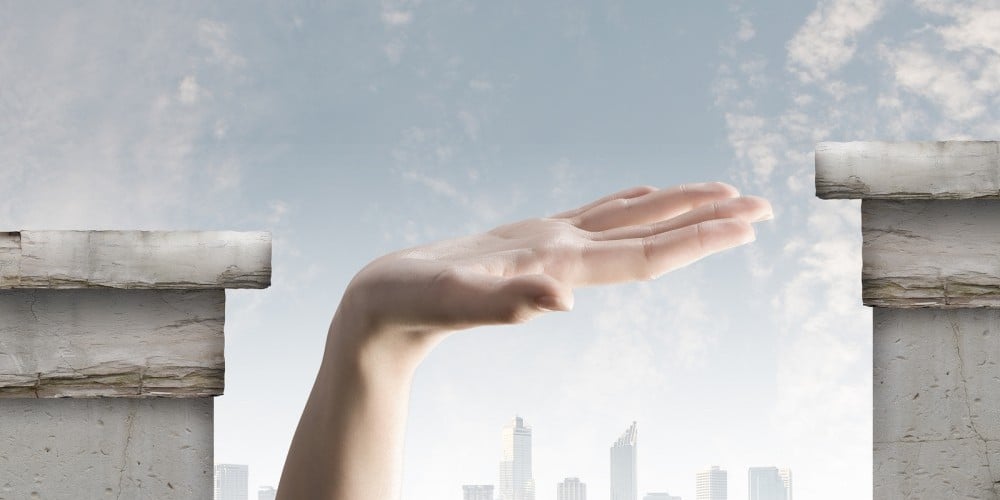 bigstock-Close-up-of-human-hand-between-62874115-e1453396626267