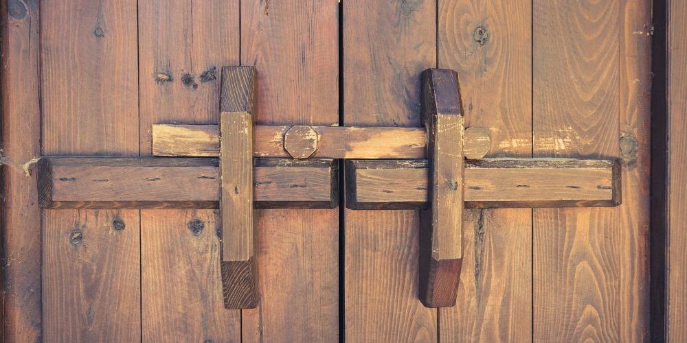 bigstock-Closed-Wooden-Door-With-Lockin-135615773-1-e1476380215295