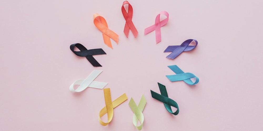 bigstock-Colorful-Ribbons-On-Pink-Backg-333442885