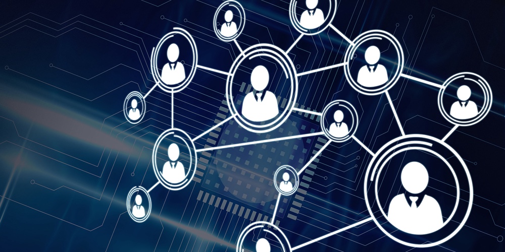 Composition of network of digital people icons over processor circuit board. global business