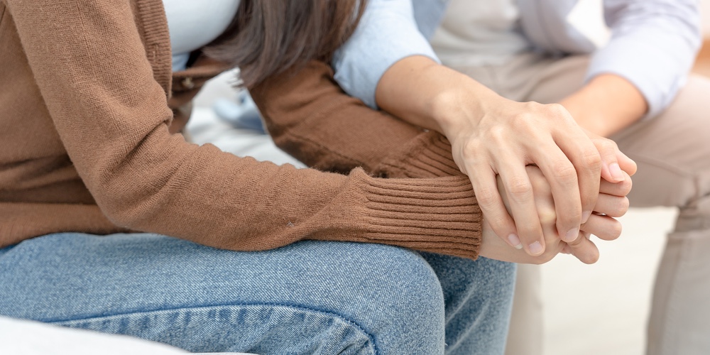 Couple Hold Hand Support Each While Discussing Family Issues With Psychiatrist. Husband Encourages W