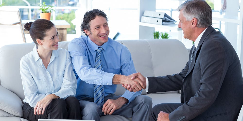 bigstock-Couple-in-meeting-with-a-finan-94361558