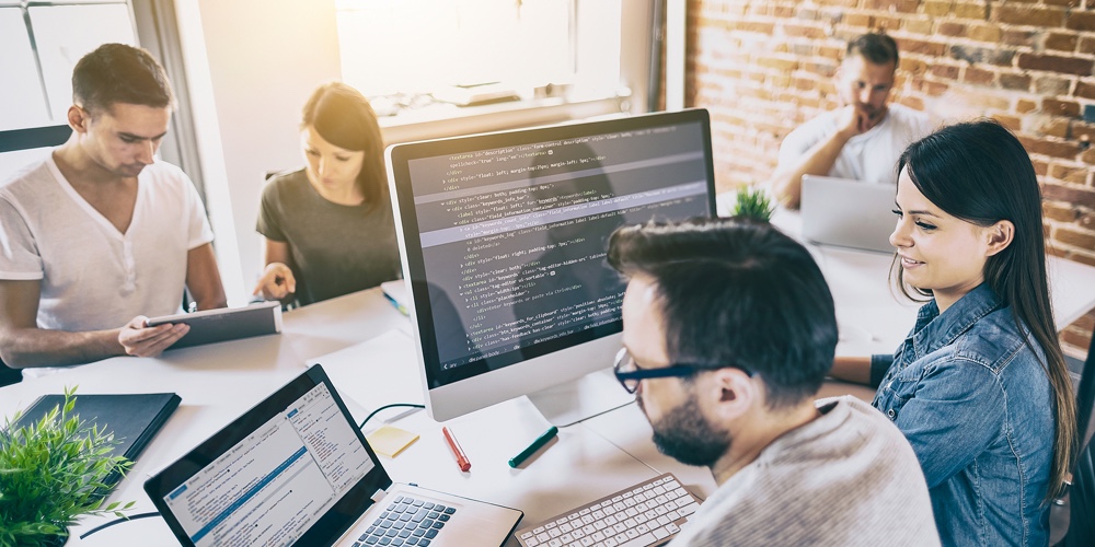 Developing Programming And Coding Technologies. Website Design. Programmer Working In A Software Dev