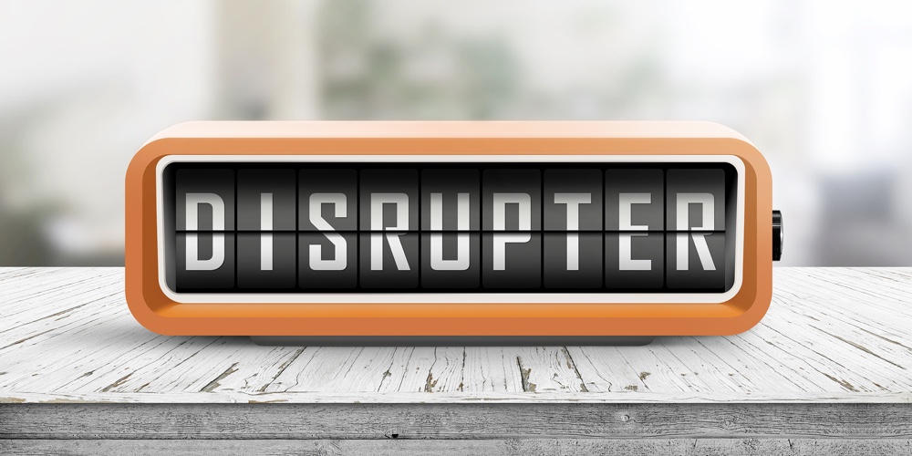 Disrupter Alarm On A Wooden Table In A Bright Room With Green Plants In The Background