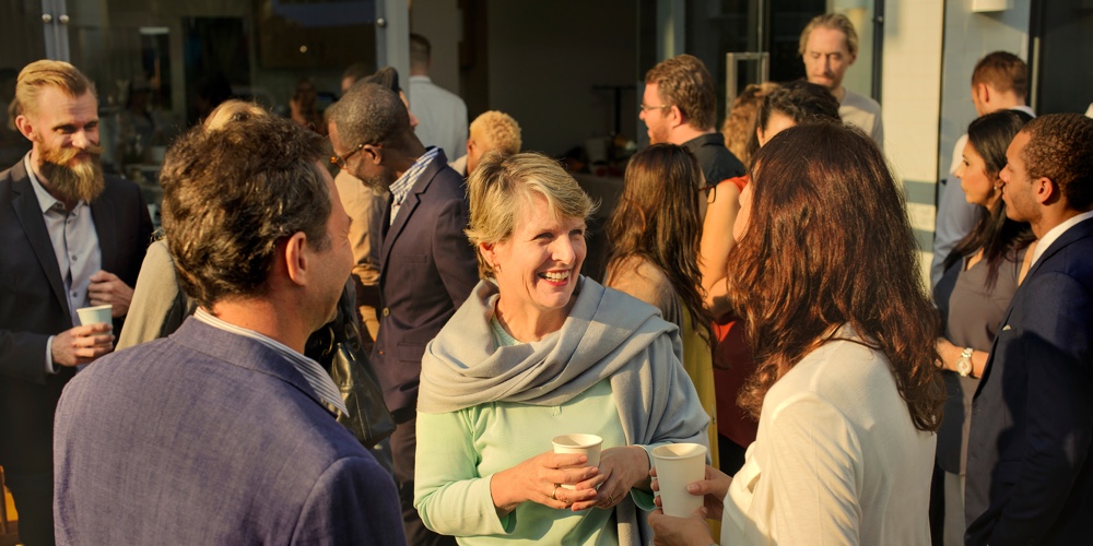 Diverse people mingling at an event