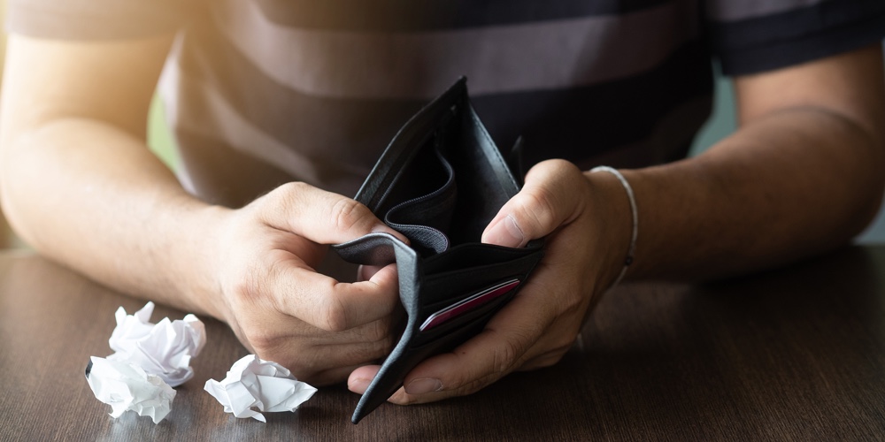 Empty Wallet In The Hands Of Man. Broke