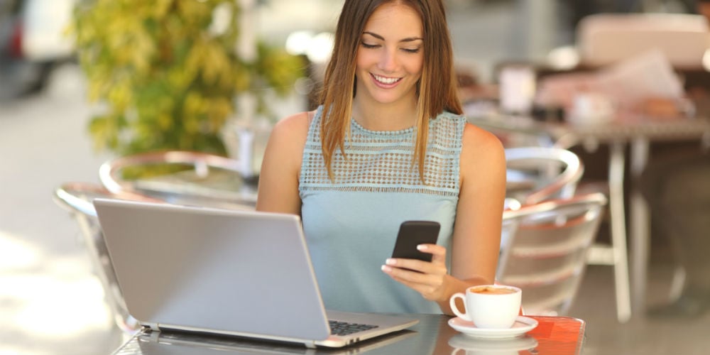 bigstock-Entrepreneur-Working-With-A-Ph-84420086