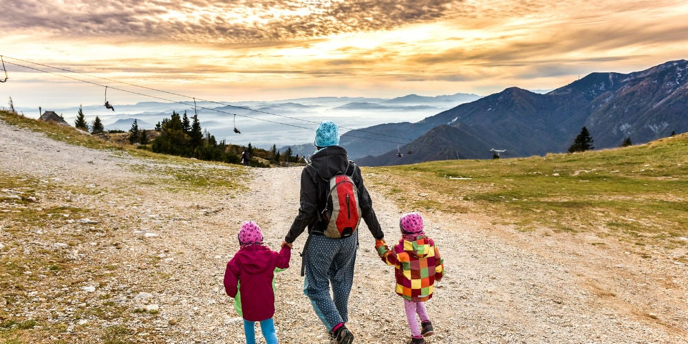 bigstock-Family-Hiking-In-The-Mountains-123586529