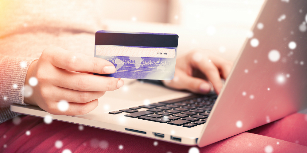 bigstock-female-hands-with-credit-card-154074626