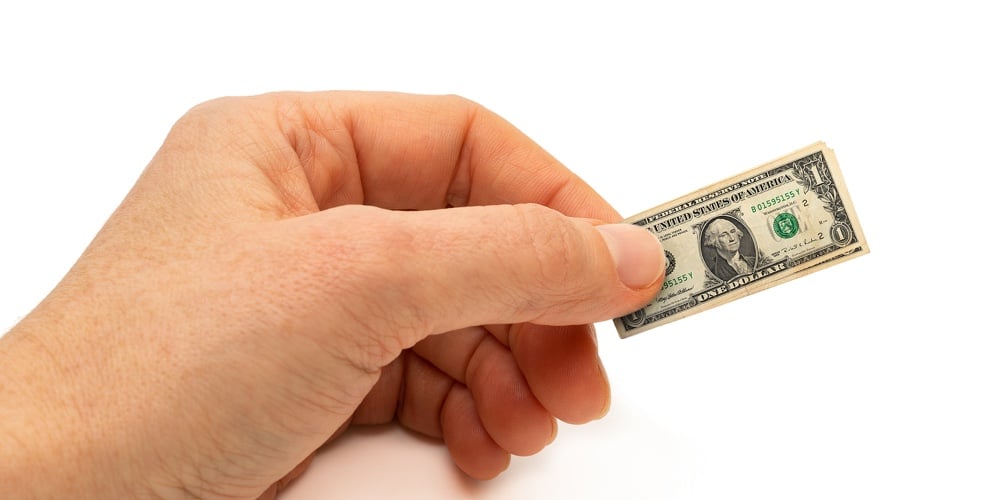 Finance  Concept Hand Holding Inflated Bank Note