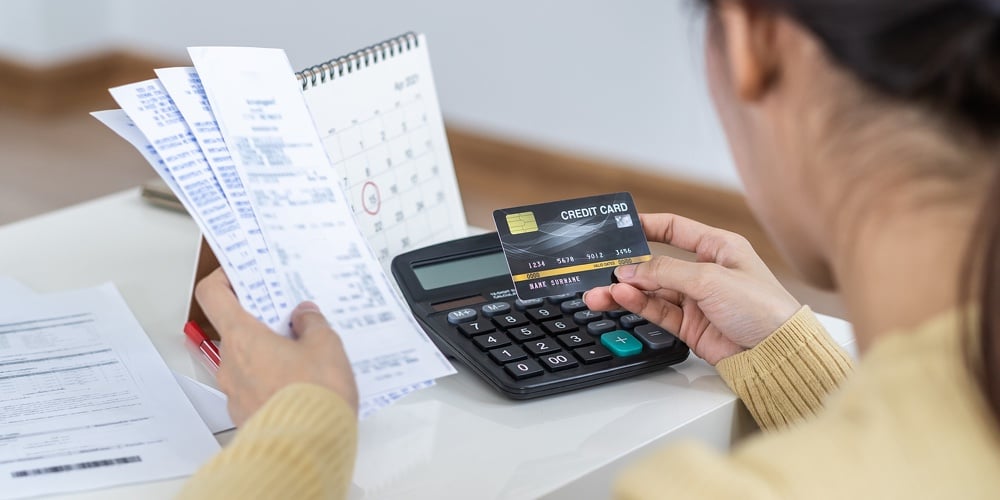 bigstock-Financial-Owe-Asian-Woman-Fem-451435387