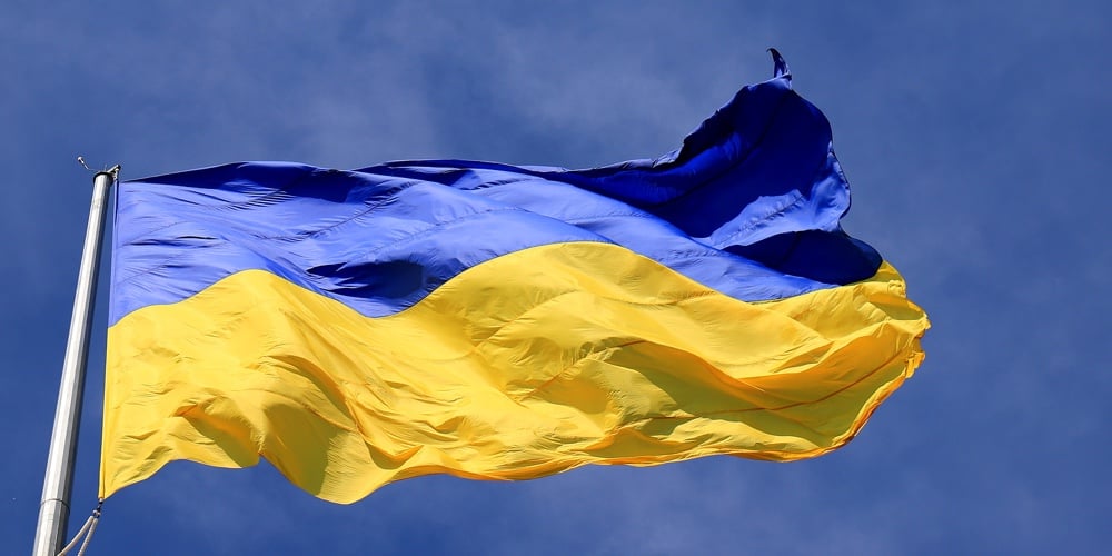 bigstock-Flag-Of-Ukraine-Flutters-In-Bl-449951629