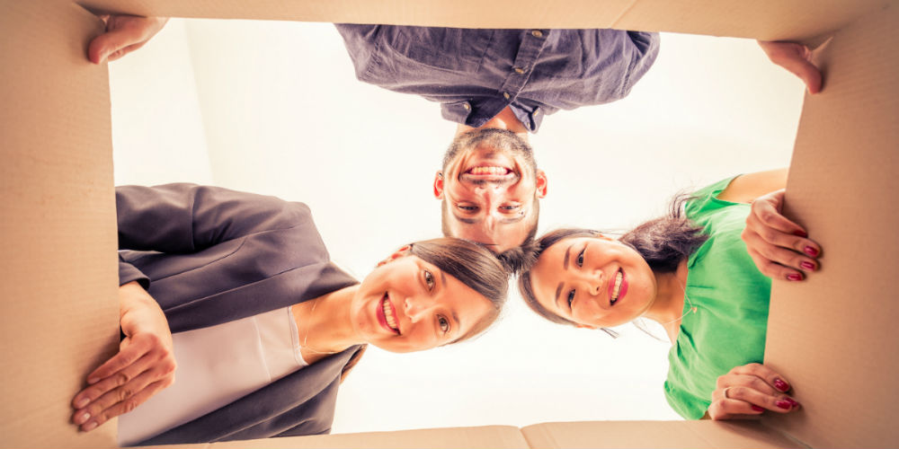 bigstock-Friends-Unpacking-Boxes-90175514