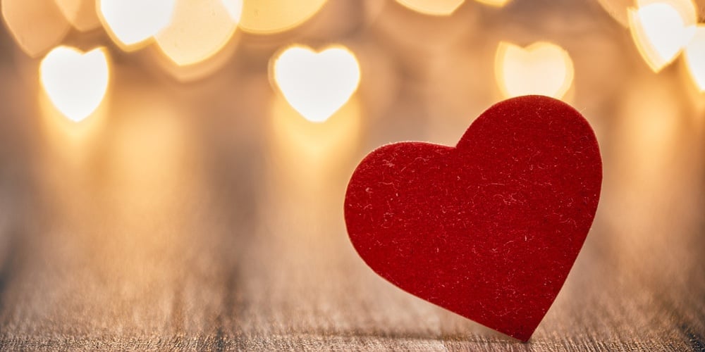 image1|Garland lights on wooden rustic background. Valentine’s day background with hearts. The concept of l