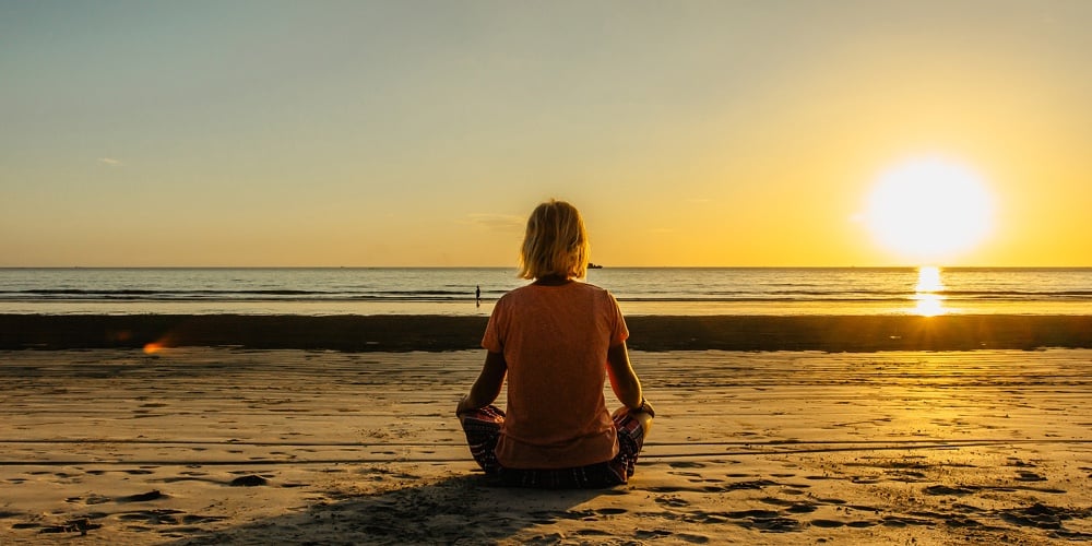 Girl Sitting On Beach And Meditating To Calm Her Mind.evening Relaxation By Sea.intended Female Tran