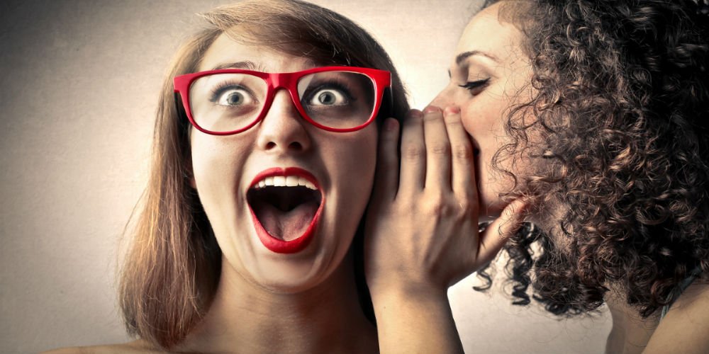 bigstock-Girls-whispering-secrets-95950802