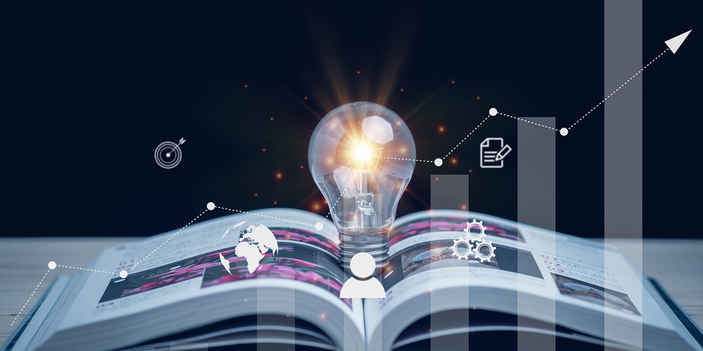 Glowing Light Bulbs On Books And Stock Graphs. Reading Inspired Concept. Concept Innovation Educatio