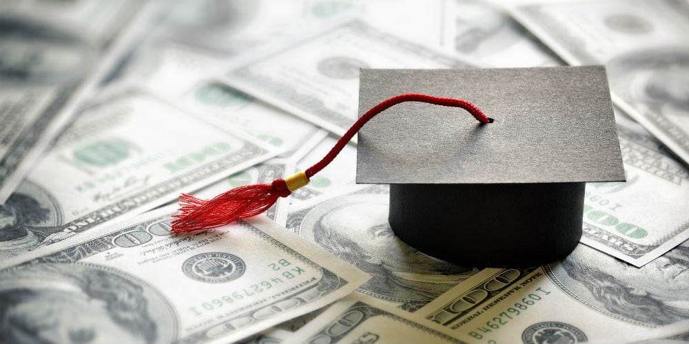 bigstock-Graduation-mortar-board-cap-on-848028651