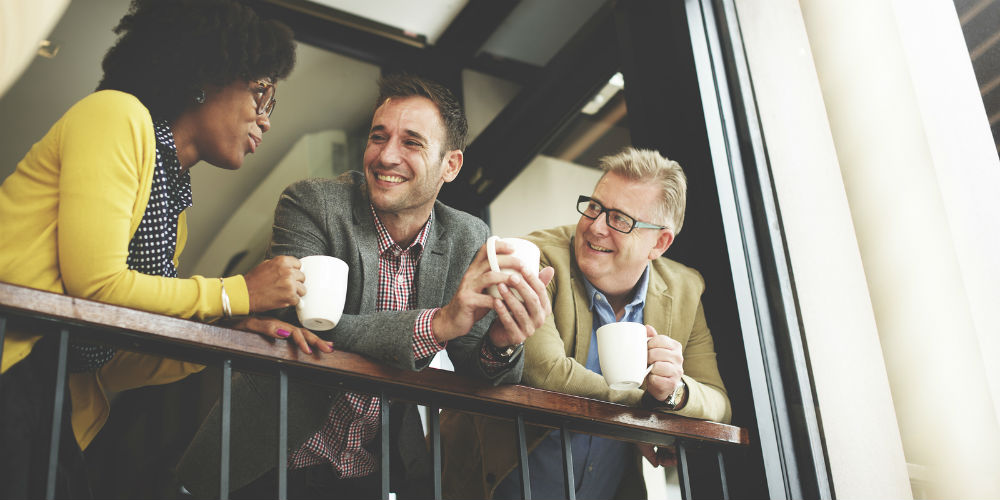 bigstock-Group-Business-People-Chatting-107614541
