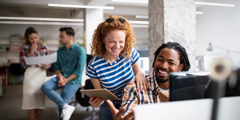 Group Of Business People And Software Developers Working As A Team In Office