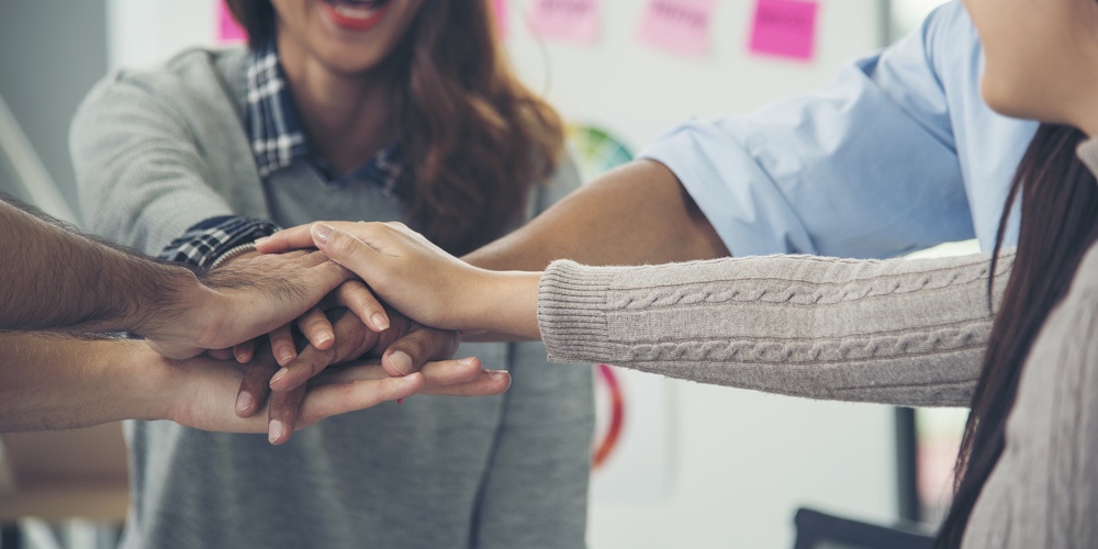 Group Of Diversity People Fist Bump Holding Hands Together Power Of Tag Team. Teamwork Multiethnic P