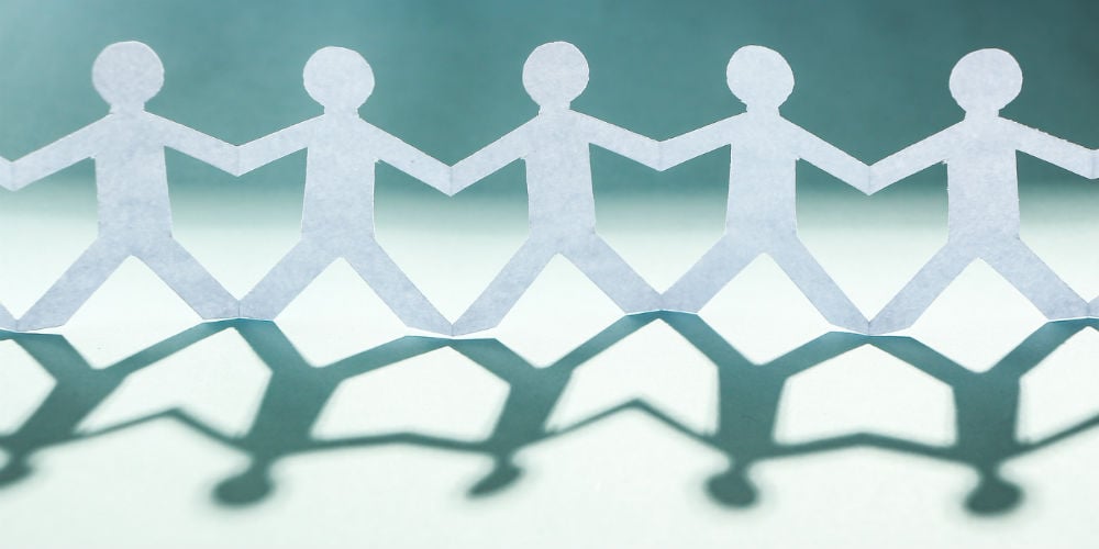 bigstock-Group-Of-People-Holding-Hands-90523328