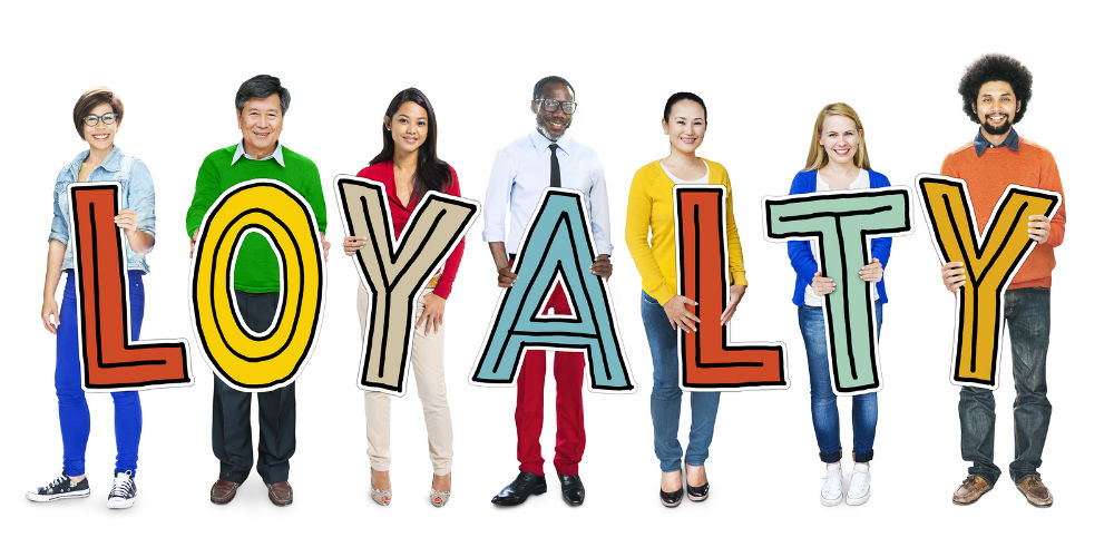 bigstock-Group-of-People-Standing-Holdi-76024640
