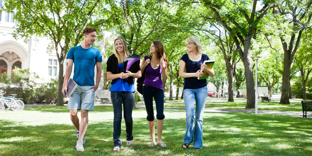 bigstock-Group-of-college-students-walk-24037724