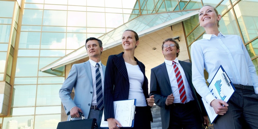bigstock-Group-of-confident-employees-w-21019007-e1449677703638