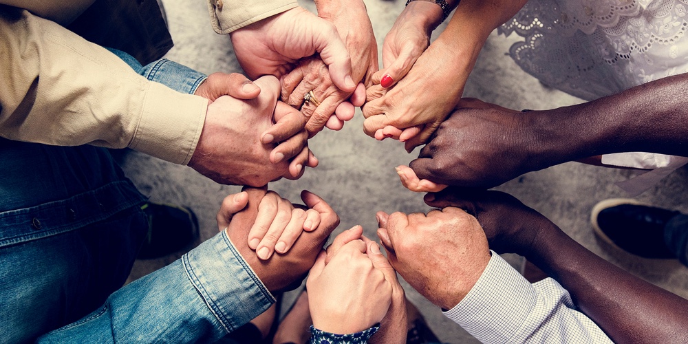 Group of diverse hands holding each other support together teamwork aerial view|Solidarity Unite People Hands Together Community Teamwork. Hands Of Spirit Team Working Together Out|Symbol And Shape Of Heart Created From Hands.the Concept Of Unity