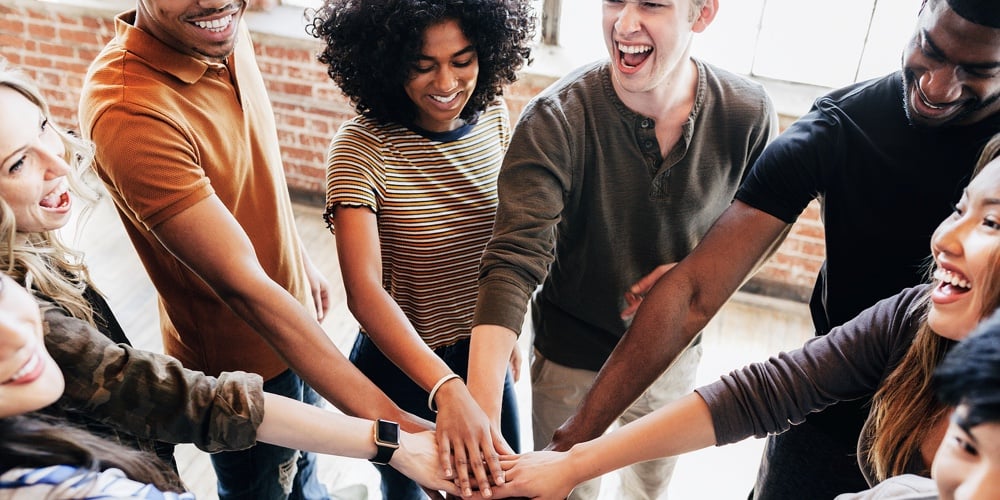 bigstock-Group-of-diverse-people-stacki-421741499