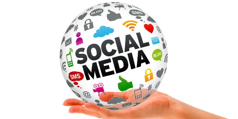 bigstock-Hand-Holding-A-Social-Media-D-30332120