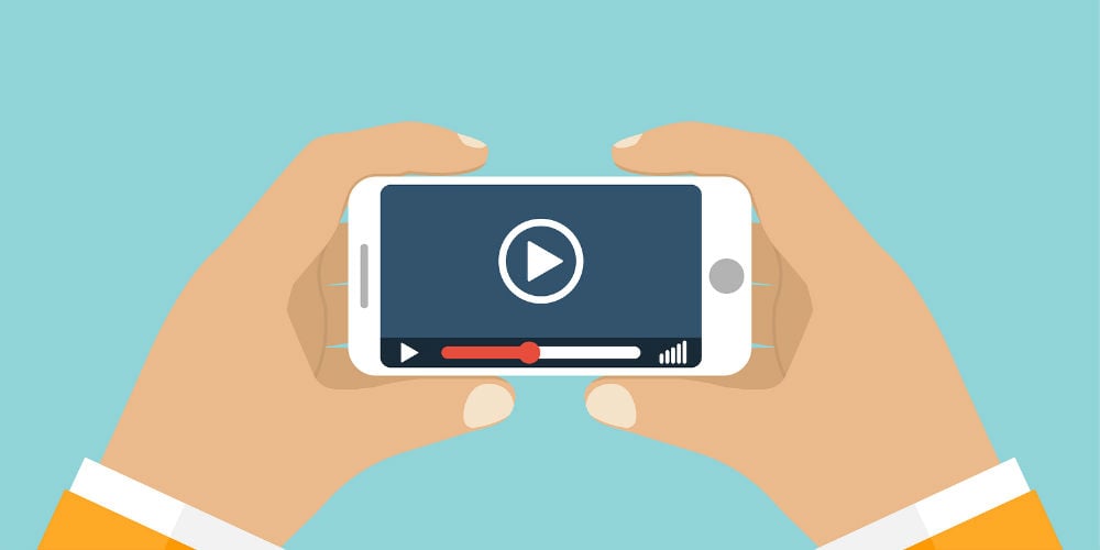 bigstock-Hand-Holds-Smartphone-Video-P-120737786
