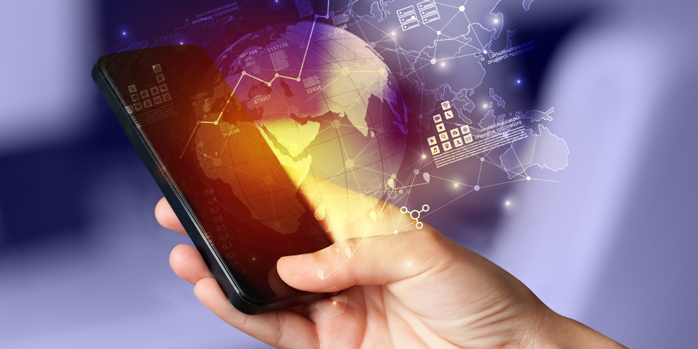 Hand using phone with global reports and stock market change concept