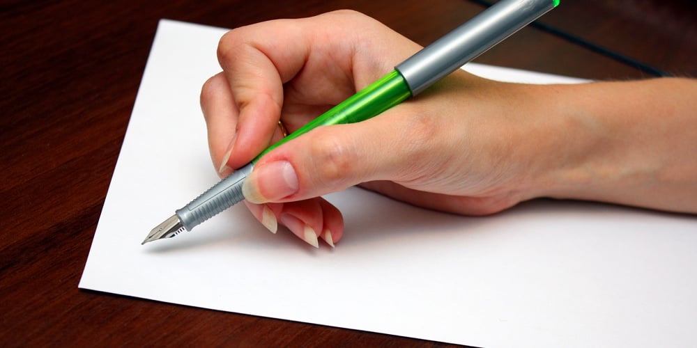 bigstock-Hand-with-pen-writing-a-letter-16070402