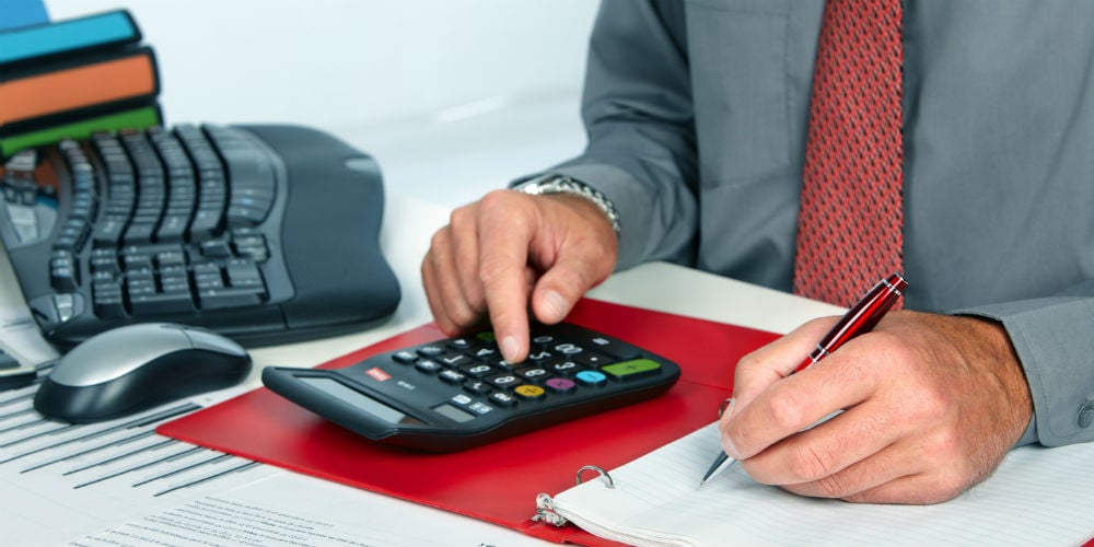 bigstock-Hands-of-accountant-business-m-81248033