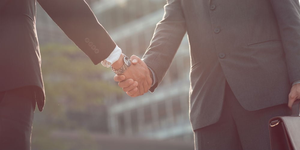 bigstock-Handshake-100314224