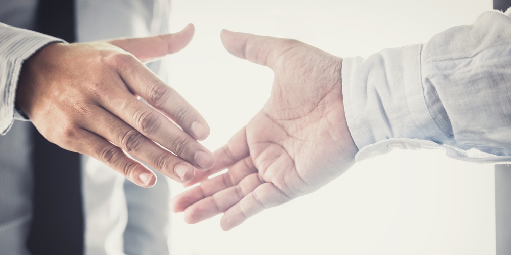 Handshake After Good Cooperation, Two Businessman Handshake After Discussing Good Deal Of Trading Co