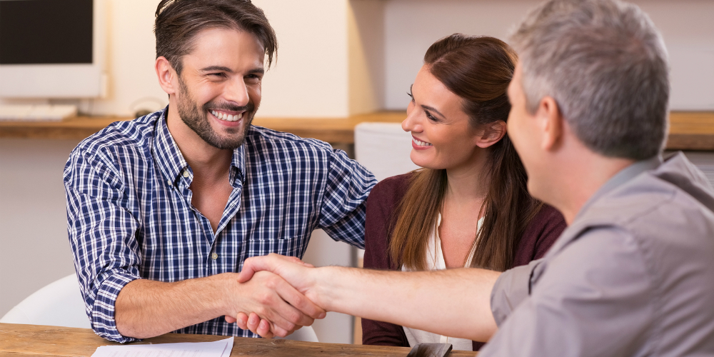 bigstock-Handshake-of-a-mature-manager–128681312