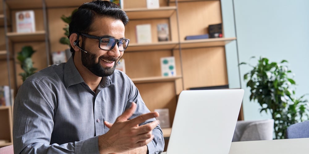 bigstock-Happy-Indian-Business-Man-Remo-414544703