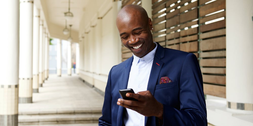 bigstock-Happy-Older-African-Businessma-116407037