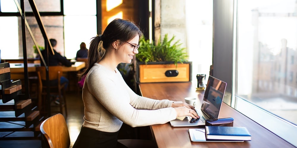 Happy Smiling Hipster Girl Skilled Social Media Content Writer Freelance Working On Laptop Computer