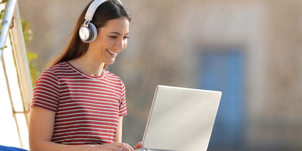 bigstock-Happy-Student-E-Learning-Weari-359160004-e1589319663781