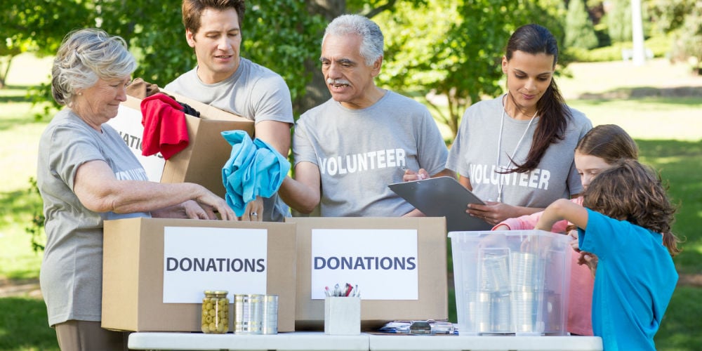 bigstock-Happy-volunteer-family-separat-89907716