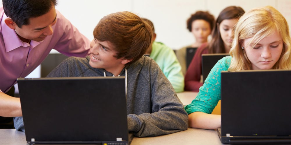 bigstock-High-School-Students-With-Teac-62481314
