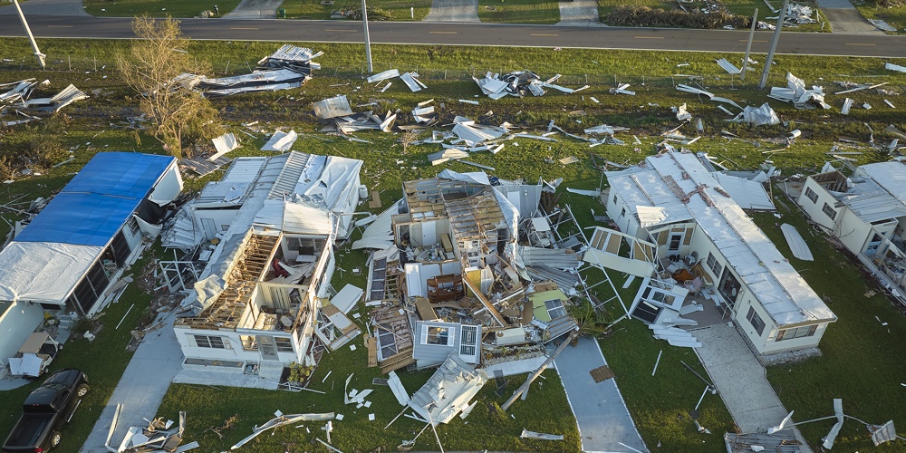 Hurricane Ian Destroyed Homes In Florida Residential Area. Natural Disaster And Its Consequences.