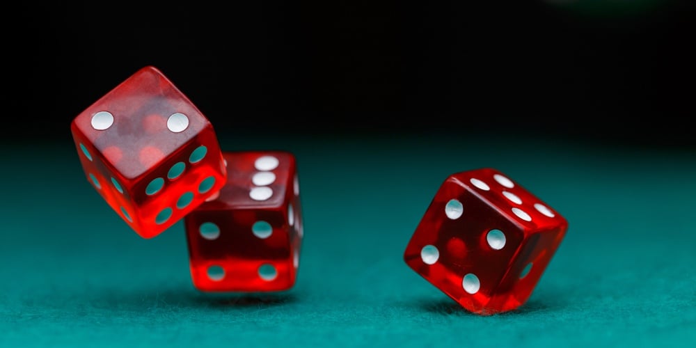 bigstock-Image-of-several-red-dice-fall-216112258