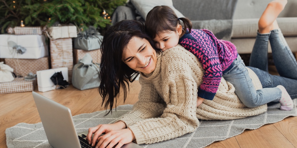 Indoor Shot Of Beautiful Happy Young Woman Shopping Online On Laptop In Cozy Christmas Interior. Mot