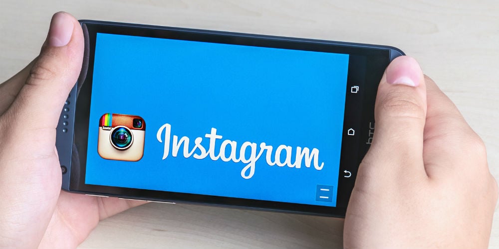 bigstock-Instagram-App-Open-In-The-Mobi-70960915