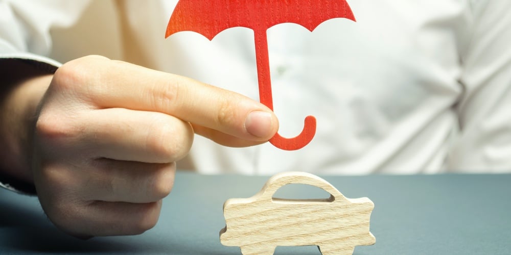 bigstock-Insurance-Agent-Holding-An-Umb-283944046